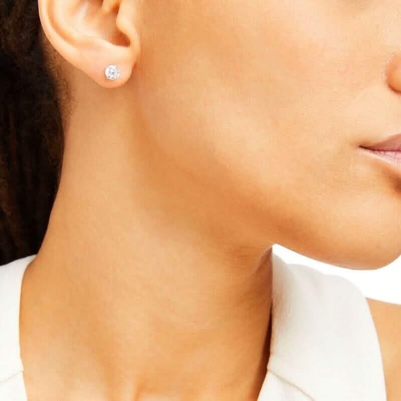 0.25 Ct T.W. Natural Diamond Studs in 14k White or Yellow Gold