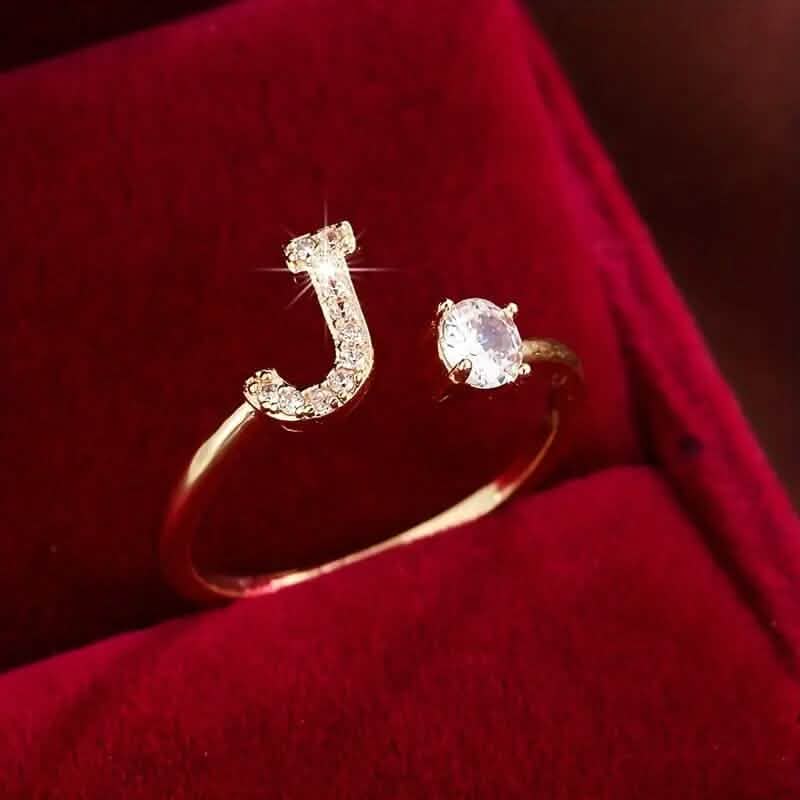 Adjustable Copper Initial Ring with Four-Claw Round Zirconia